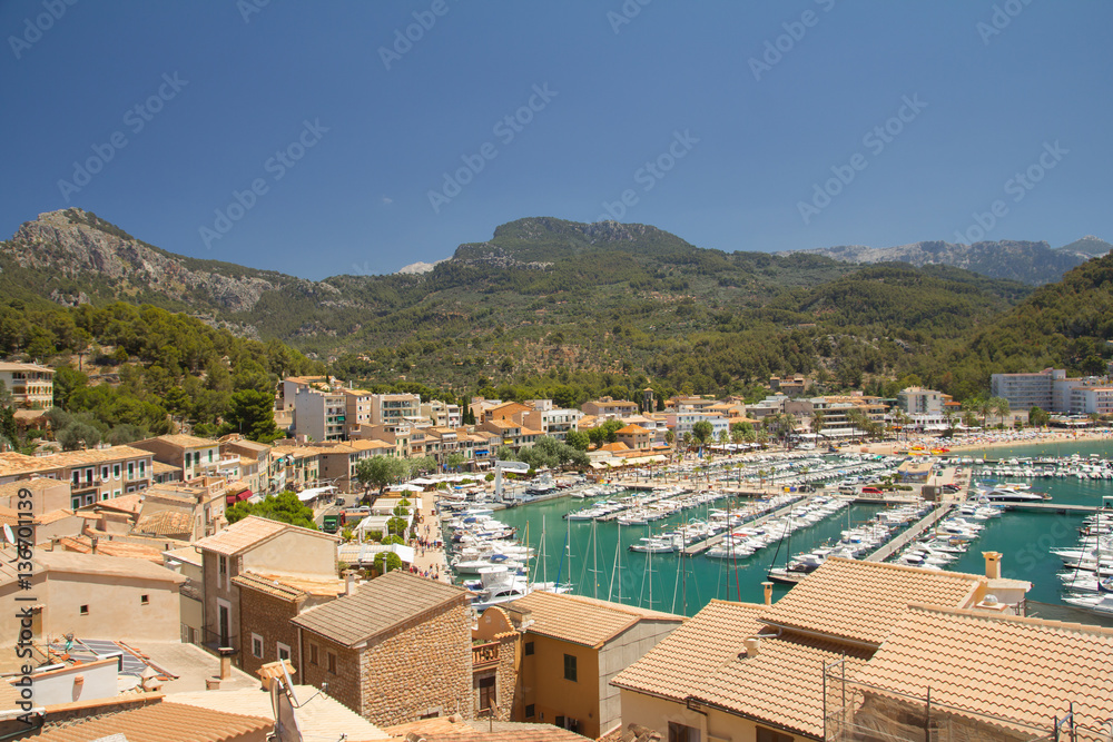 view of town rooftops and sea in summer mediterranean resort