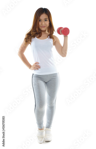 Fitness woman lifting weights smiling happy isolated on white ba