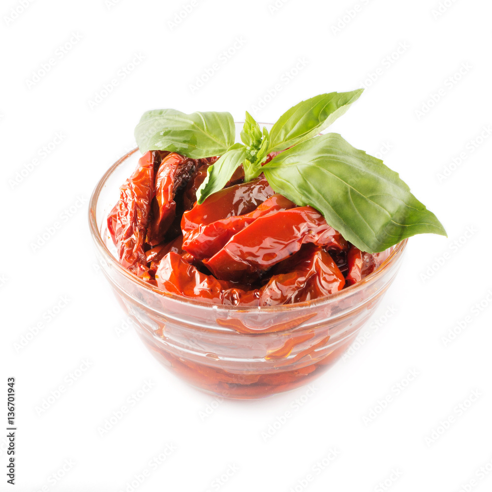 Italian appetizer - sundried tomato in bowl on the white background Italian appetizer - sundried tomato in bowl on the white background