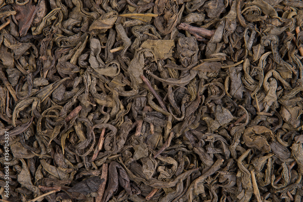 Dry green tea leaves background texture Dry green tea leaves background texture