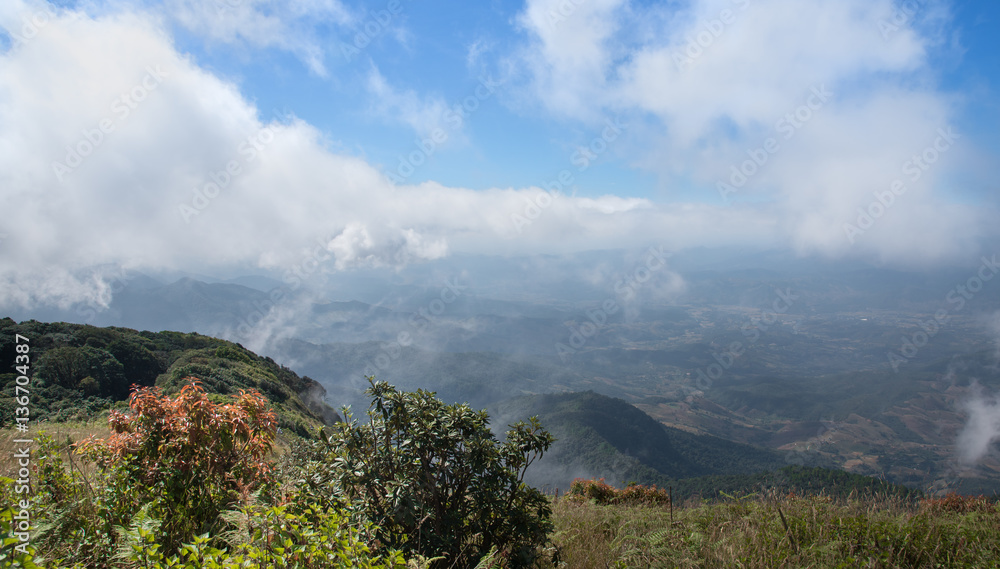 Mountains, blue sky and cloud landscape at Intanon mountain, Chiangmai, Thailand