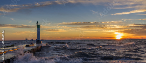 Lake Huron Lighthouse and Pier at Sunset