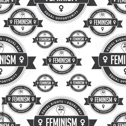 Raised fist icon badge of feminism in chic gray seamless pattern. Repeating pattern that declares feminism as equal rights, equal pay and equal opportunity. EPS 10 vector.