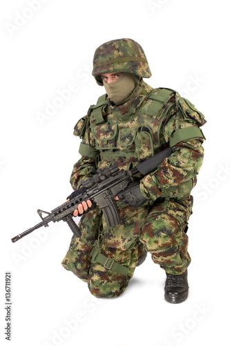 Armed soldier isolated on white background