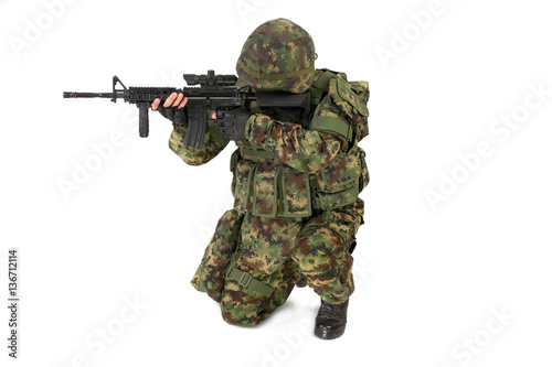 Armed soldier isolated on white background