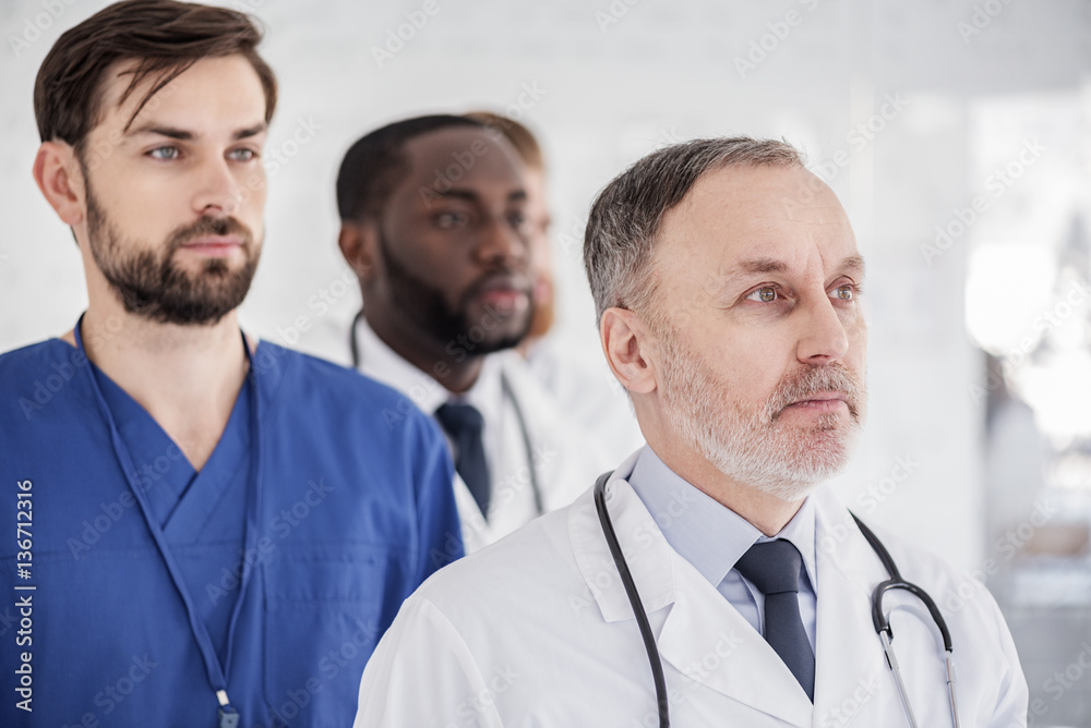 Serene physicians situating in office of clinic Serene physicians situating in office of clinic