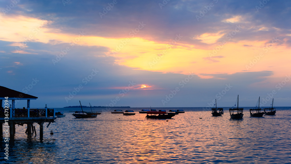 Typical boats of Zanzibar at sunset