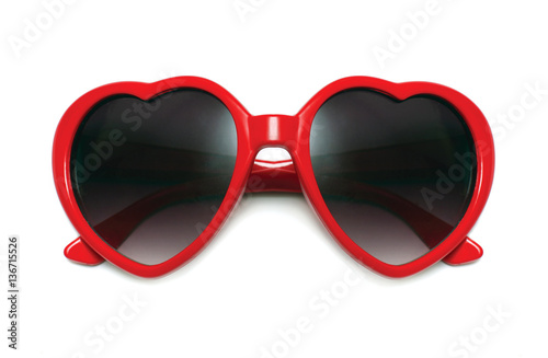 Red sunglasses heart shape isolated on a white background closeu