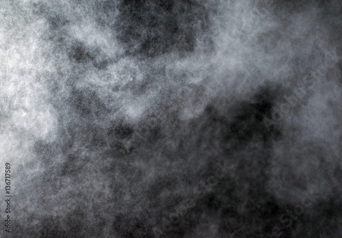 abstract powder explosions isolated on black background.