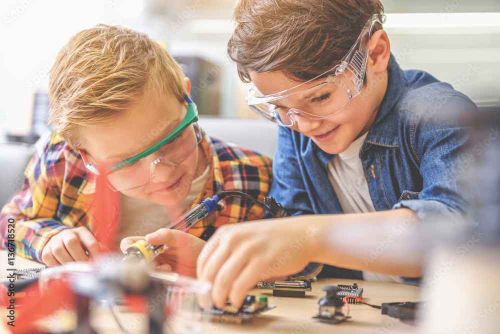 Happy smiling children in workshop Happy smiling children in workshop