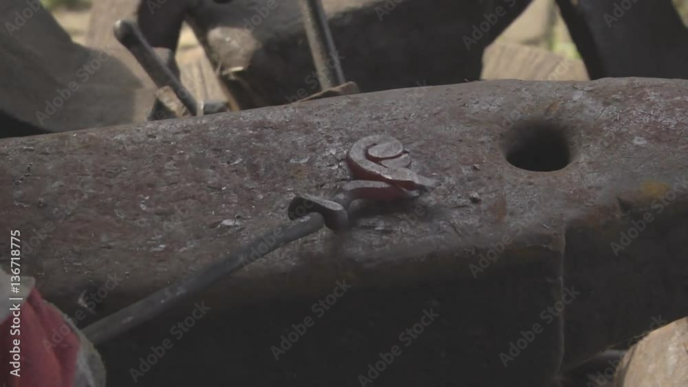 Ancient craft blacksmith The heating and forging the iron hands of a blacksmith Ancient craft blacksmith The heating and forging the iron hands of a blacksmith