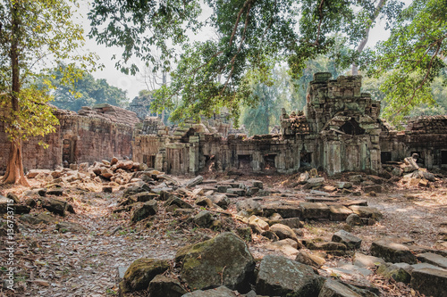 Od ruins of Preah Khan Temple in Siem Reap, Cambodia. Preah Khan has been left largely unrestored, with trees and other vegetation growing among the ruins.