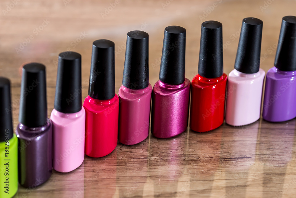 many Nail polish colorful on desk. many Nail polish colorful on desk.