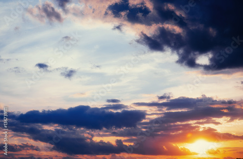 cumulus clouds at sunset.