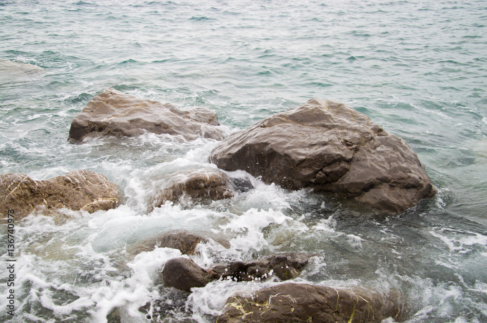 rock wave spatter, beach rock with sea wave and clear water rock wave spatter, beach rock with sea wave and clear water