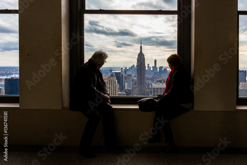 tourists looking to Empire State Building