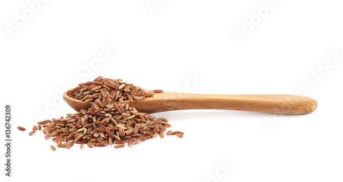 Pile of brown rice grains isolated