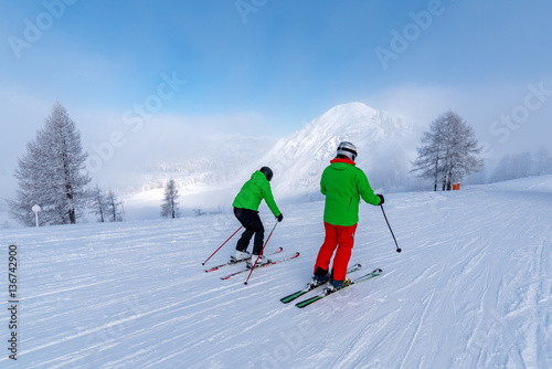 Skiers in Alps mountains