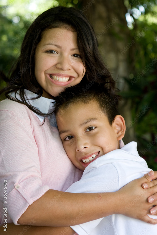 Happy Hispanic mother and her son. Happy Hispanic mother and her son.