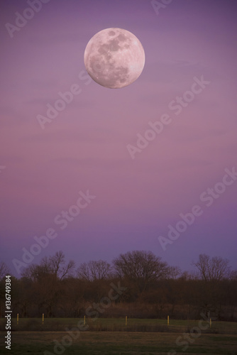 Fanciful photo illustration of the moon at sundown