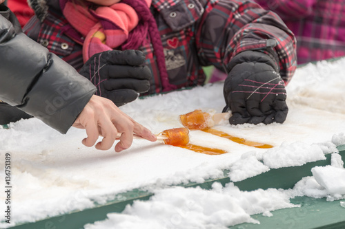 Photos Maple taffy on snow at the sugar shack, in Montreal, Canada (2017)
