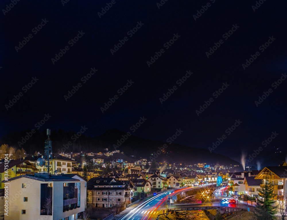 night view of modern bridge to mountain village