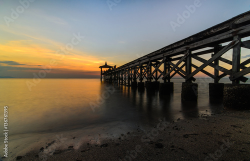 Wood bridge to sunset © noomnaren
