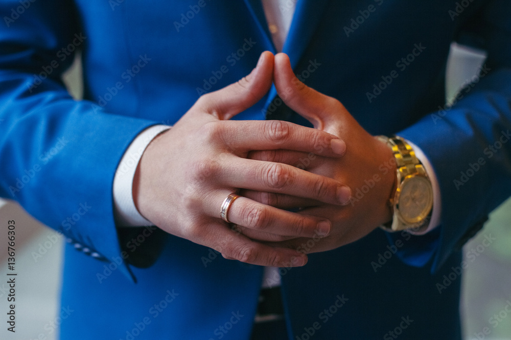 Successful entrepreneur and businessman. Hands of the men conducting the negotiations. Confident married man with clock on hand. Leader, Manager