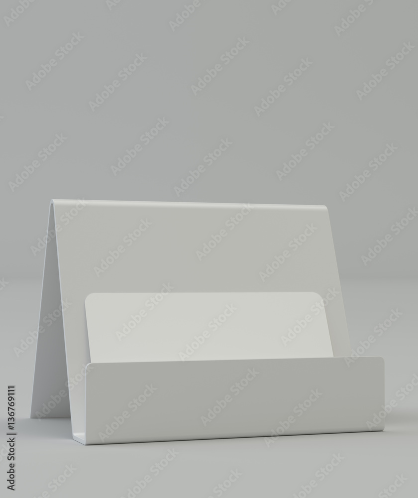 Blank business card on the holder on gray background with reflection Blank business card on the holder on gray background with reflection