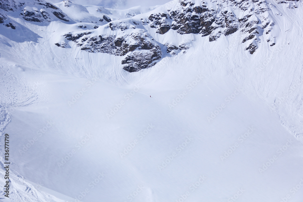Freeriders skiing off piste in deep fresh snow in the mountains. The month of April in the French alps.
Freeriders skiing off piste in deep fresh snow in the mountains. The month of April in the French alps.