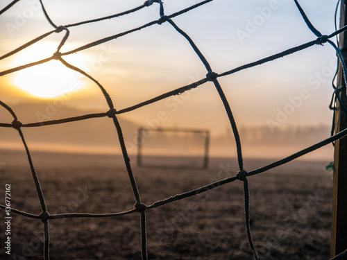 Beautiful foggy soccer pitch