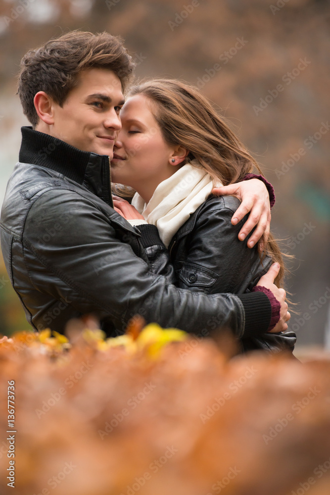 Autumn portrait of attractive happy couple Autumn portrait of attractive happy couple
