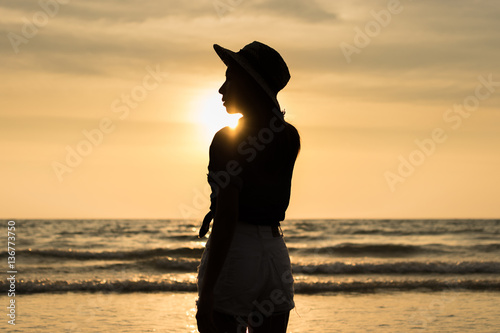 silhouette female traveler