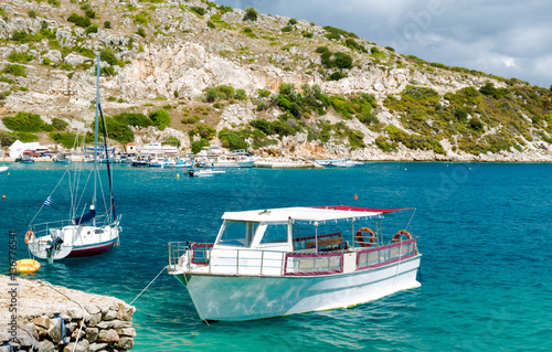 Boats near island in the Mediterranean sea © PASTA DESIGN