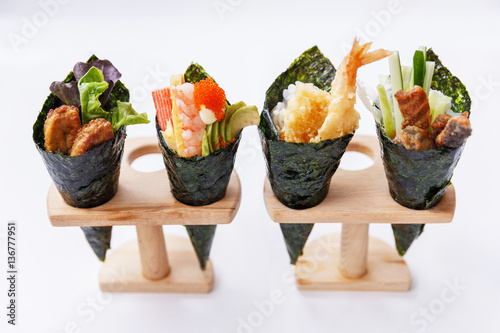 California Hand Roll Sushi Set : Foie Gras, Shrimp with Kani, Tamagoyaki, Avocado and Tobiko. Another is Shrimp Tempura and Crispy Tuna Skin with Sliced Cucumber. photo