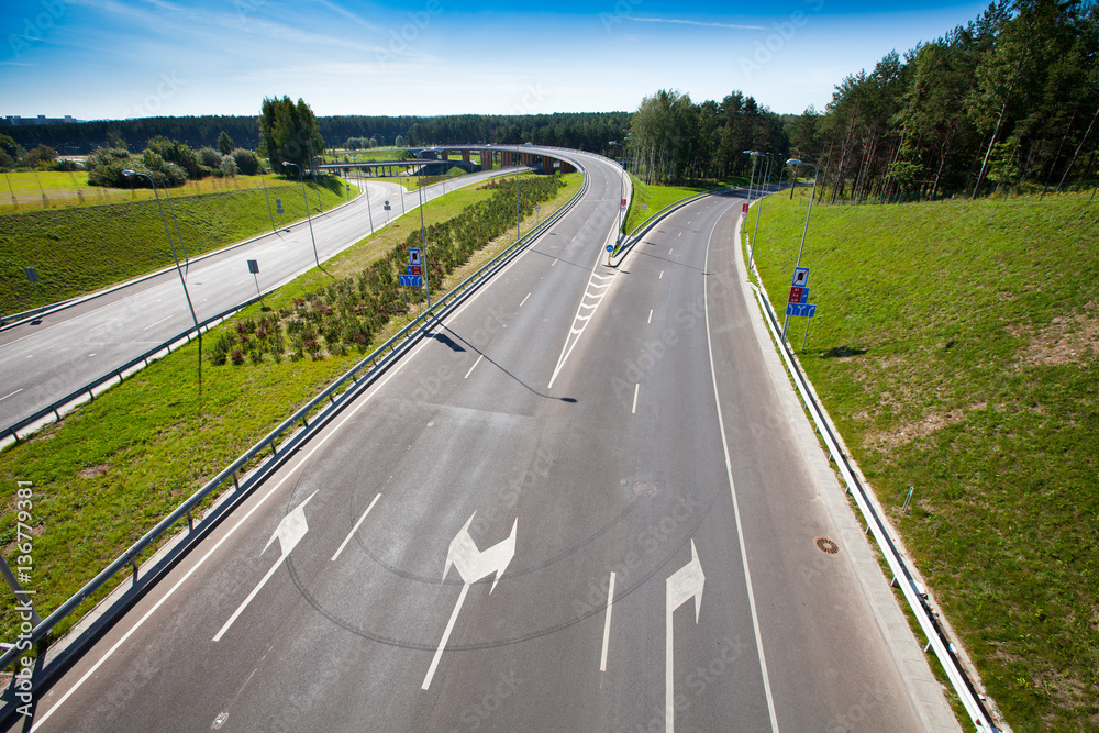 Fototapeta premium Highway (motorway) in Vilnius, Lithuania. A newly constructed street connects IXB transport corridor with Vilnius International Airport.