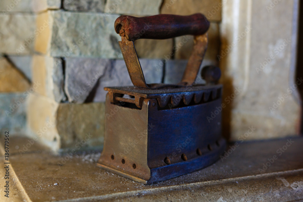 Old iron, coal iron flatiron on the white background Old iron, coal iron flatiron on the white background