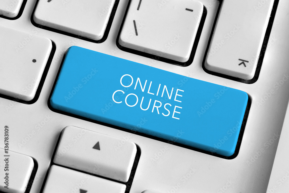 White keyboard with blue online course button White keyboard with blue online course button