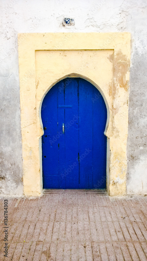 Simple traditional blue Moroccan door, Essaouira, Morocco