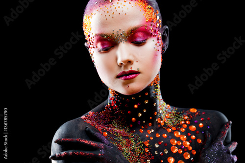 Obraz na plátně Young attractive girl in bright art-makeup, body painting.