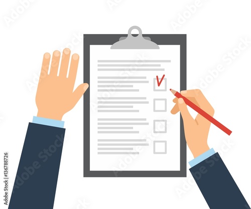 The person fills in the checklist with a pencil