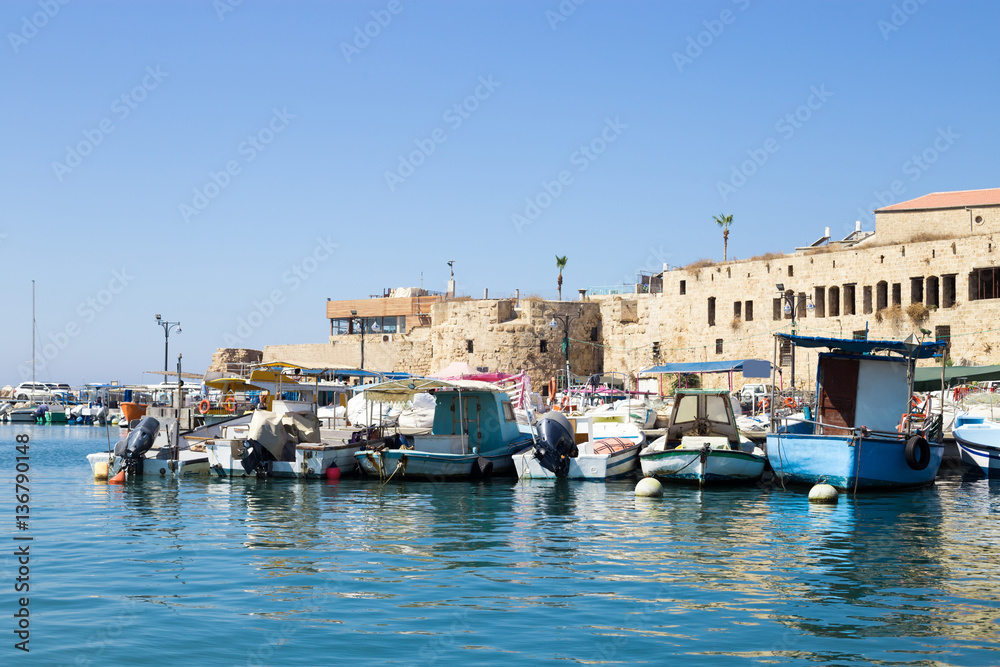 Old boats on the quay in Acre, Israel