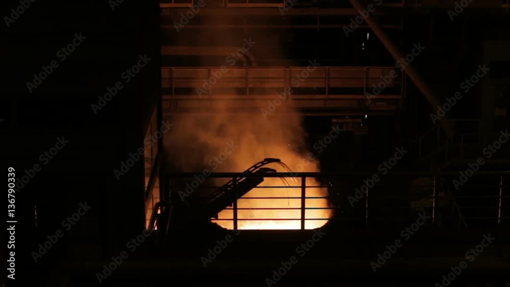 Loading additives into container with liquid metal in metallurgical plant Loading additives into container with liquid metal in metallurgical plant