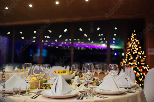 Christmas buffet, table and wine glasses,catering photo