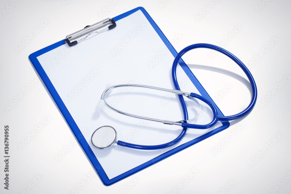Top view of the medical report folder and stethoscope Top view of the medical report folder and stethoscope