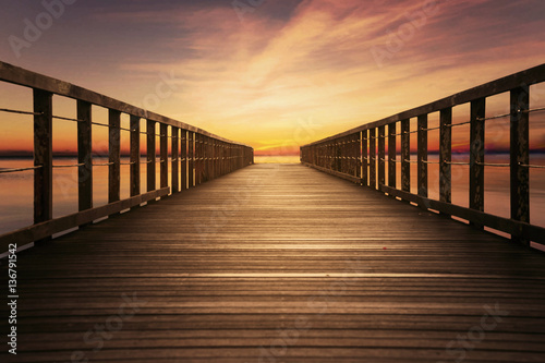 Wooden pier with beautiful sky © Creativa Images