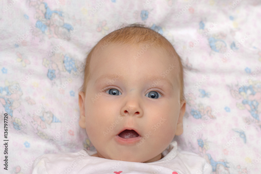 beautiful cute baby opened his mouth very much surprised and scared, isolated close-up beautiful cute baby opened his mouth very much surprised and scared, isolated close-up