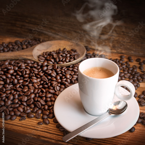 Cup of espresso coffee and beans © gudrun