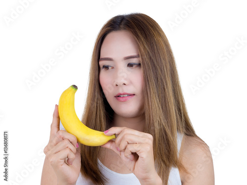 Asian Woman smiling And holding banana, isolated on white background. Healthy Food concept.