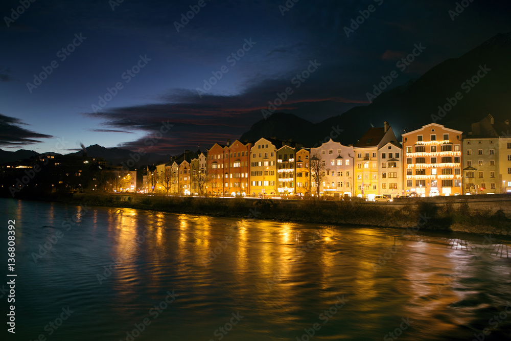 Night cityscape  with river  in the Innsbruck city